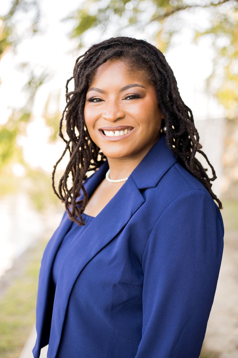 Portrait of Dr. Christiana Redeaux smiling outdoors