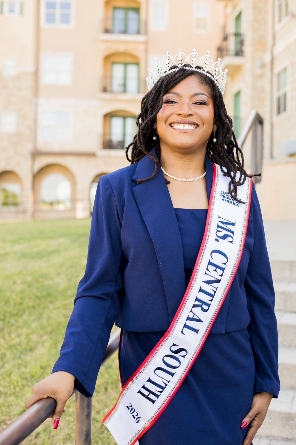 Dr. Christiana Redeaux wearing her Ms. Central South crown, smiling