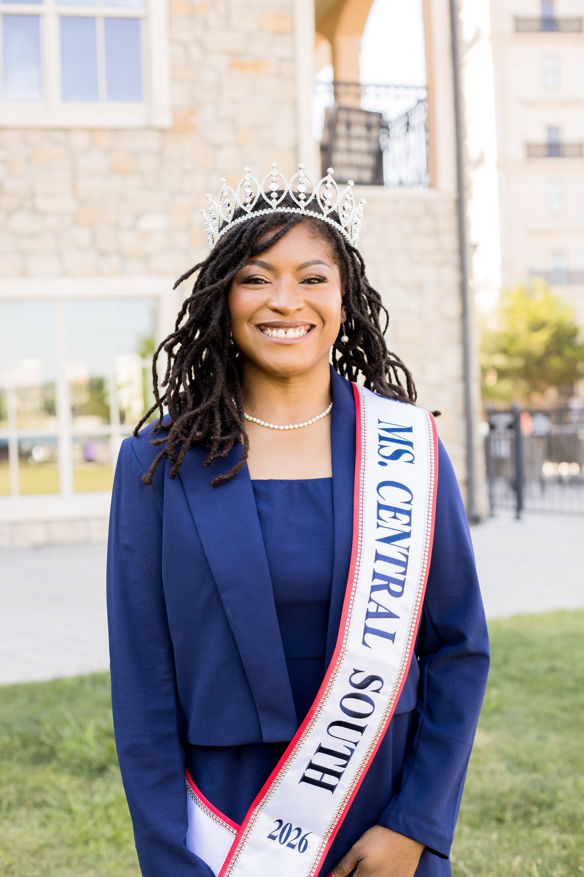 Dr. Christiana Redeaux wearing her Ms. Central South 2026 crown and sash